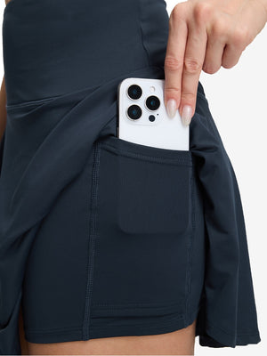 Detail view of inner pocket on navy blue women's high waisted golf skirts with 4 inner pockets