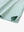Close-up of hem slit detail on EMERALD Elegant Performance Jacquard Polo