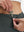 Detail view of inner pocket on dark grey women's gym golf shorts with liner pocket
