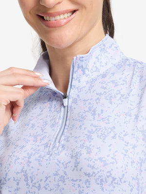 Detail view of neck zipper on pink purple rose women's sleeveless q-zip print quick dry golf tops