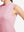 Detail view of armhole on lavender women's moisture-wicking mock neck sleeveless golf tops
