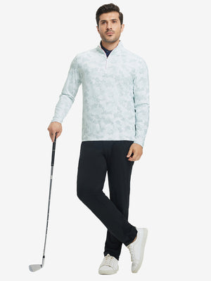Model holding golf club in Full print lightweight quarter zip pullover with sporty light grey camo