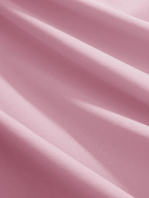 Close-up texture of lavender women's athletic quarter zip tank tops fabric showing detailed athletic material and weave.