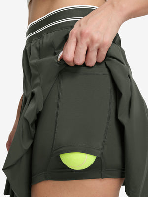 Detail view of inner pocket on army green women's moisture-wicking athletic tennis skirts