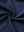Fabric close-up of navy cotton blend pique plain shirt, breathable pique fabric texture.