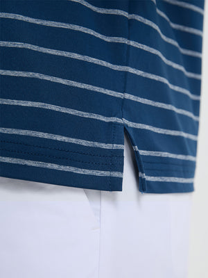 Detail view of hem on navy peony/arctic white non-curl ribbed collar striped polo shirts