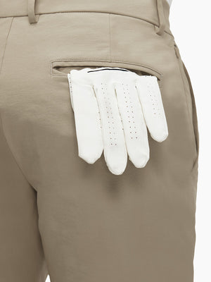 Detail view of back pocket on khaki grey flat front flex cotton blend golf shorts