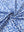 Close-up of blue white mosaic performance jersey print polo fabric texture.