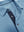 Collar and button detail close-up, ultra-comfort slim fit roma knit polo shirts in light blue