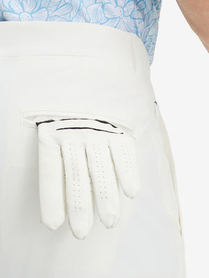 Detail view of back pocket on white stretch cotton blend slim fit golf trousers 5 pockets
