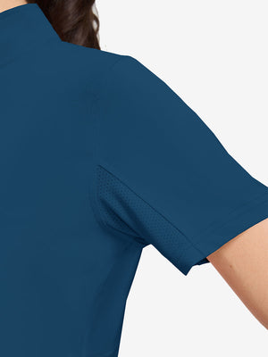 Detail view of cuff on blue women's breathable 1/4 zip pullover golf shirts