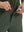 Detail view of the zipper on the grey green stretch soft flat front dress golf shorts, highlighting secure closure