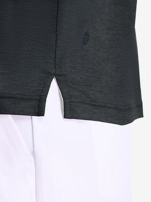 Hem detail close-up in black heather of performance heather contrast collar polo shirts.