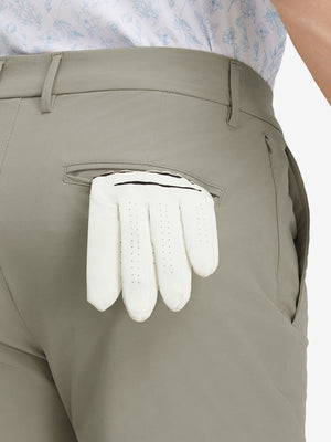 Detail view of back pocket on khaki grey stretch cotton blend slim fit golf trousers 5 pockets