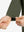 Detail view of cuff on army green waterproof lightweight rain jacket with hood