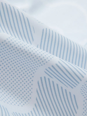 Close-up texture of grey irregular shape premium ribbed collar print polo shirts fabric showing detailed premium material and weave.