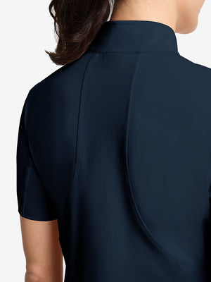 Detail view of back design on navy women's breathable 1/4 zip pullover golf shirts