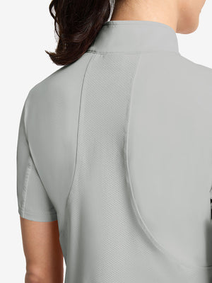 Detail view of back design on light grey women's breathable 1/4 zip pullover golf shirts