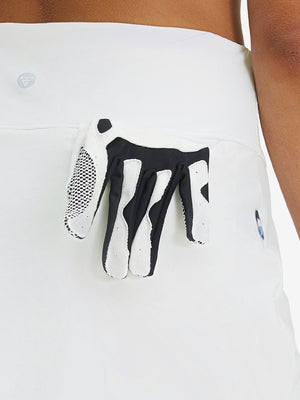 Back view of pocket on white high waist built-in short a-line golf skirt with 5 pockets