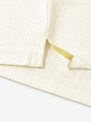 Hem detail close-up in beige of nylon blend casual jacquard polo shirts.