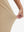 View showing loose fit of light khaki women's lightweight athletic sweatpants