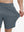 View showing loose fit of grey blue 4 way stretch breathable workout athletic shorts