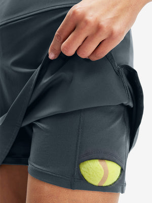 Inside view of pocket on dark grey high waist built-in short a-line golf skirt with 5 pockets