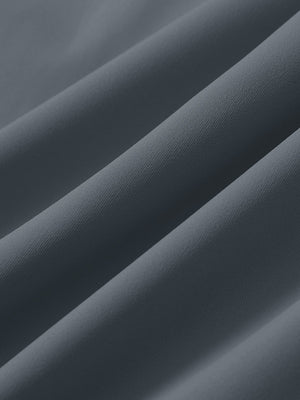 Close-up texture of grey blue 4 way stretch breathable workout athletic shorts fabric showing weave detail.
