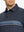 Front chest view of model wearing Chest Print Polo Shirts in Dark Grey