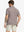 Back half-body shot of model showcasing the back of Sport Fit Stripe Polo in Brown Stripe