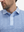 Front shot from nose to chest of model wearing light blue houndstooth stylish full print contrast collared golf polo shirts